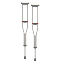 pair of tall crutches  to move AFTER surgery or inlury